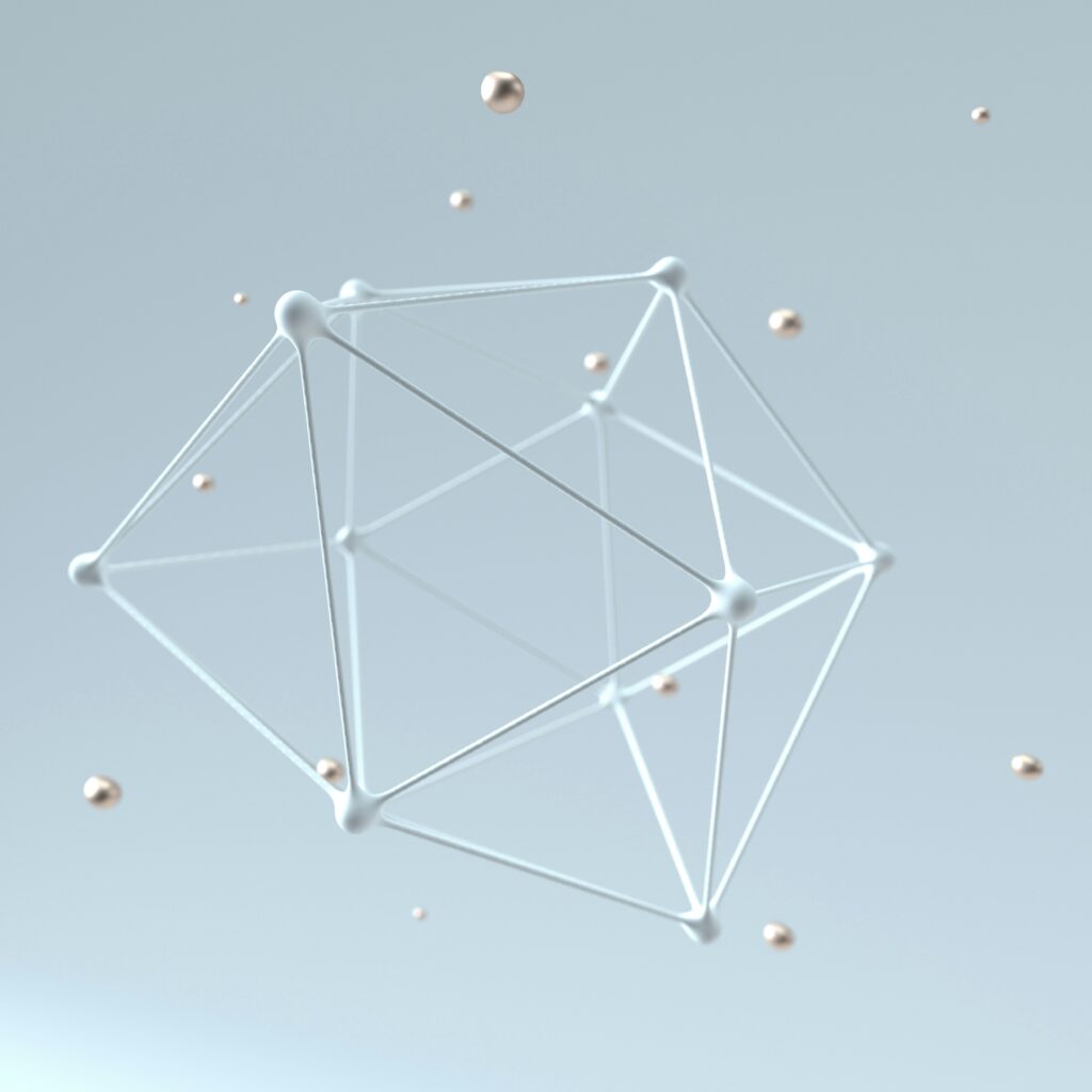 Abstract 3D geometric structure with interconnected lines and floating metallic spheres on a light background.